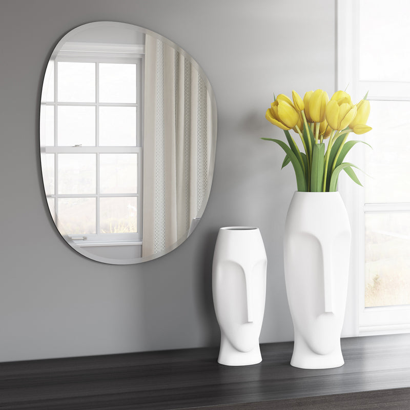 The Frameless Mirror