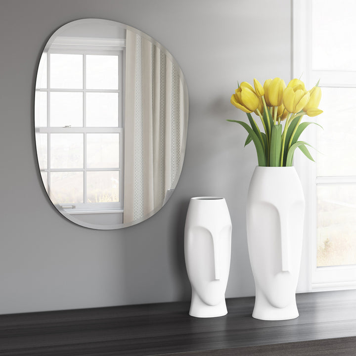 The Frameless Mirror