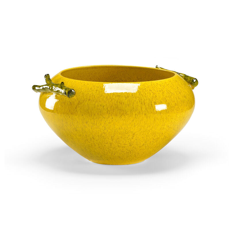 Yellow ceramic bowl with handles on a white background