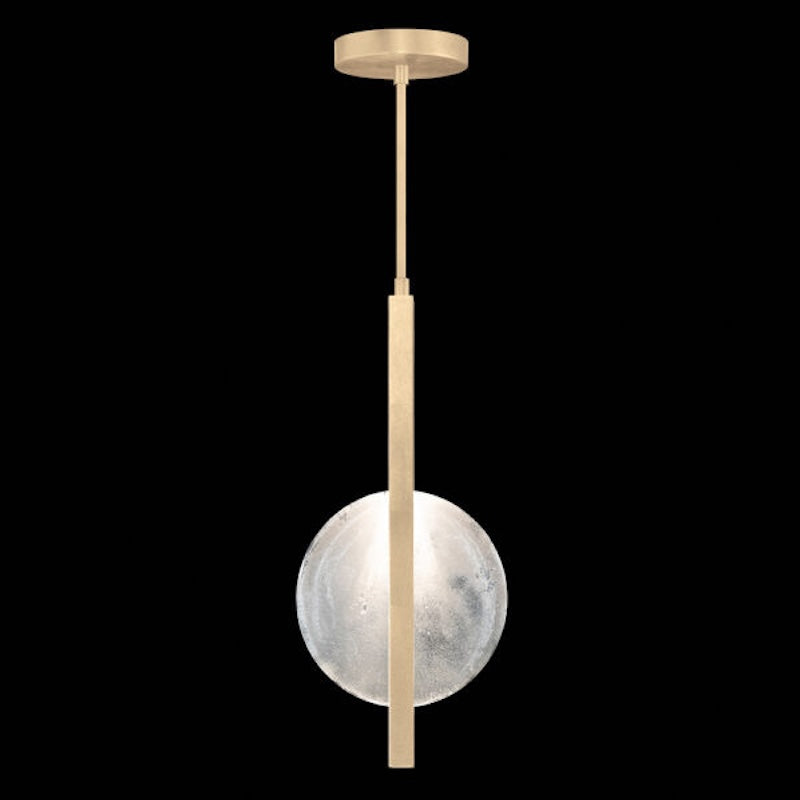 Pendant light with spherical glass shade and gold fixture on a black background
