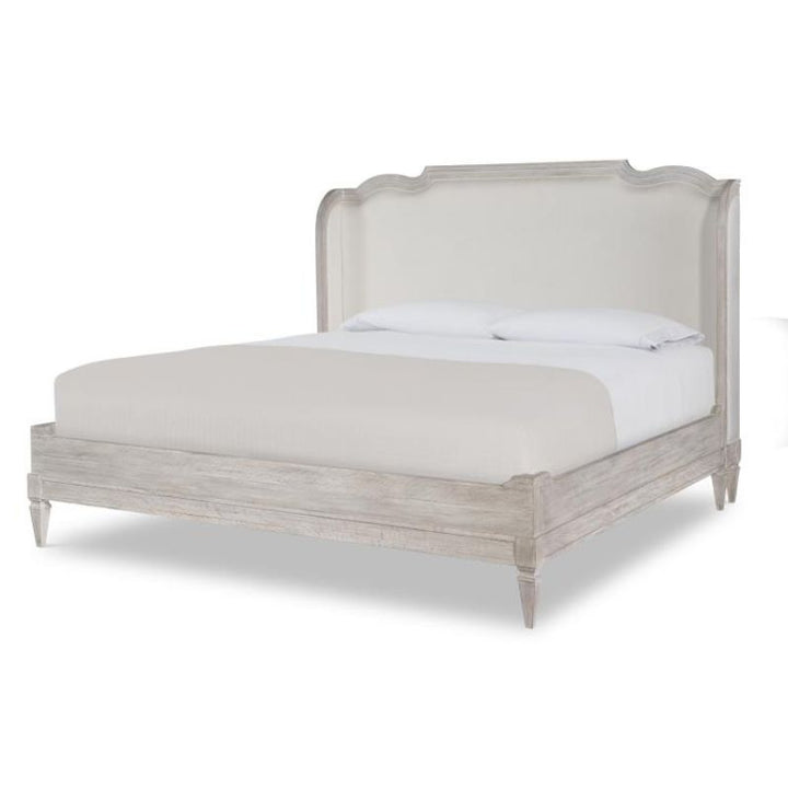 Wooden bed with white bedding on a white background
