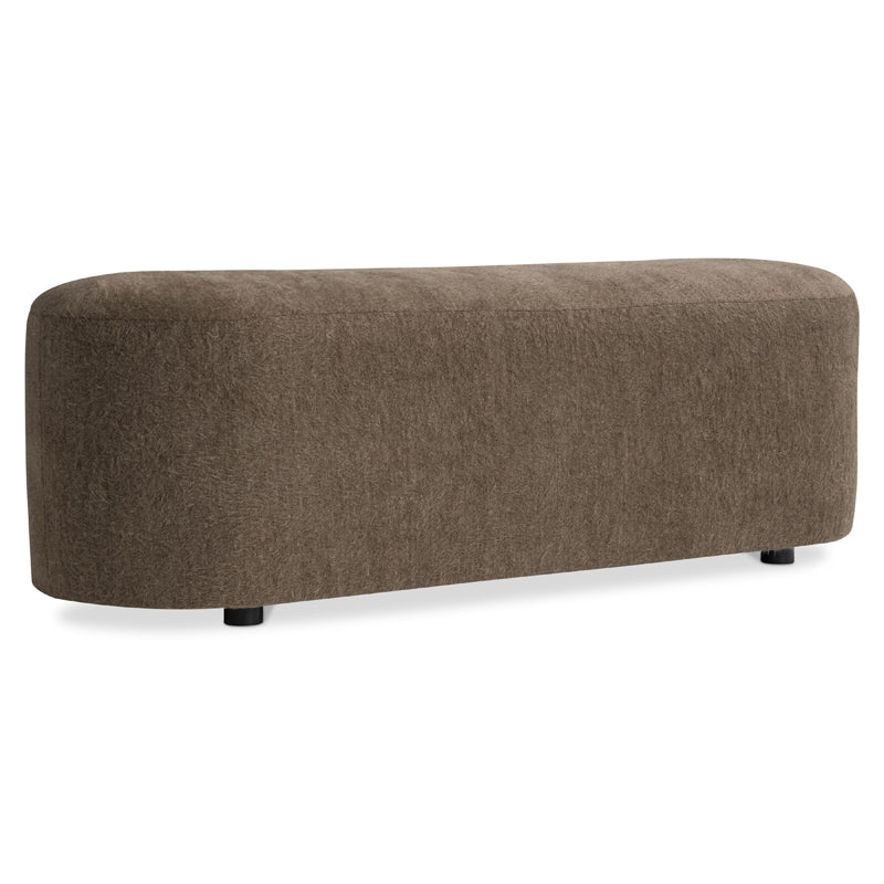 Brown upholstered bench on a white background