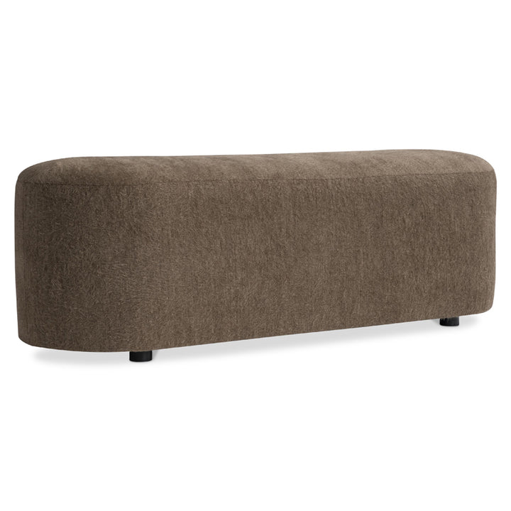 Brown upholstered bench on a white background