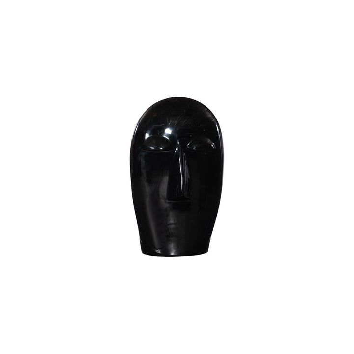 Emerging Face Sculpture